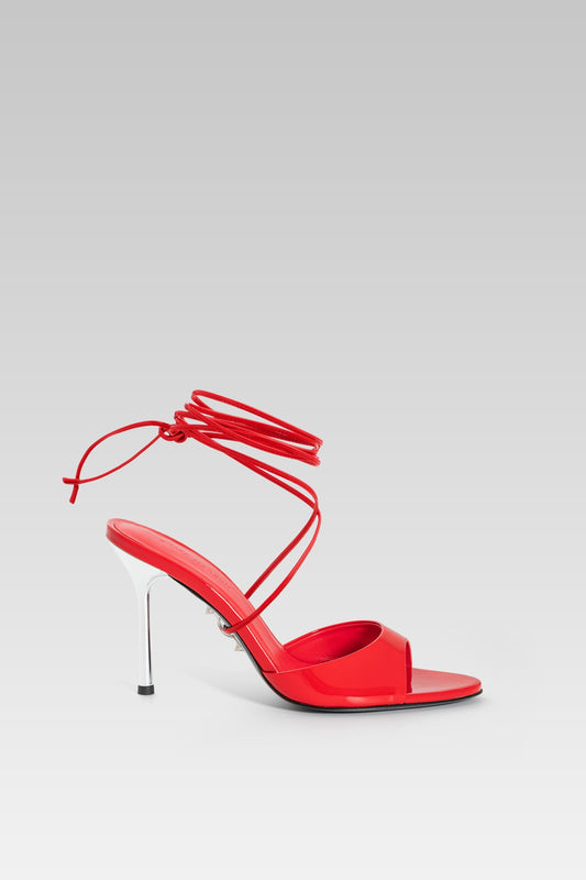 High heel lace-up sandals in glossy red patent leather with ankle straps, Alba 95 by Silvia Marson.
